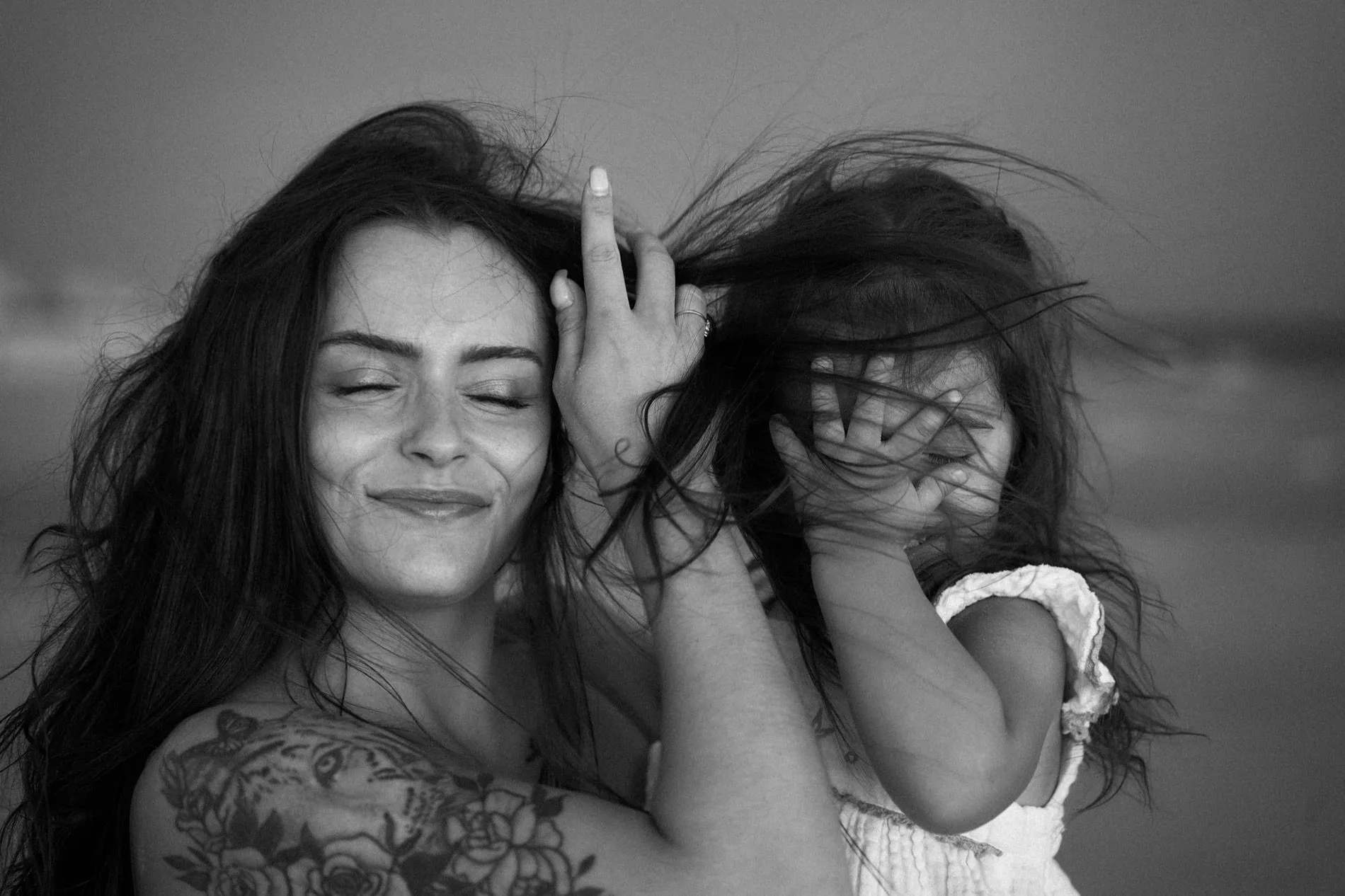 A mother and daughter in the wind